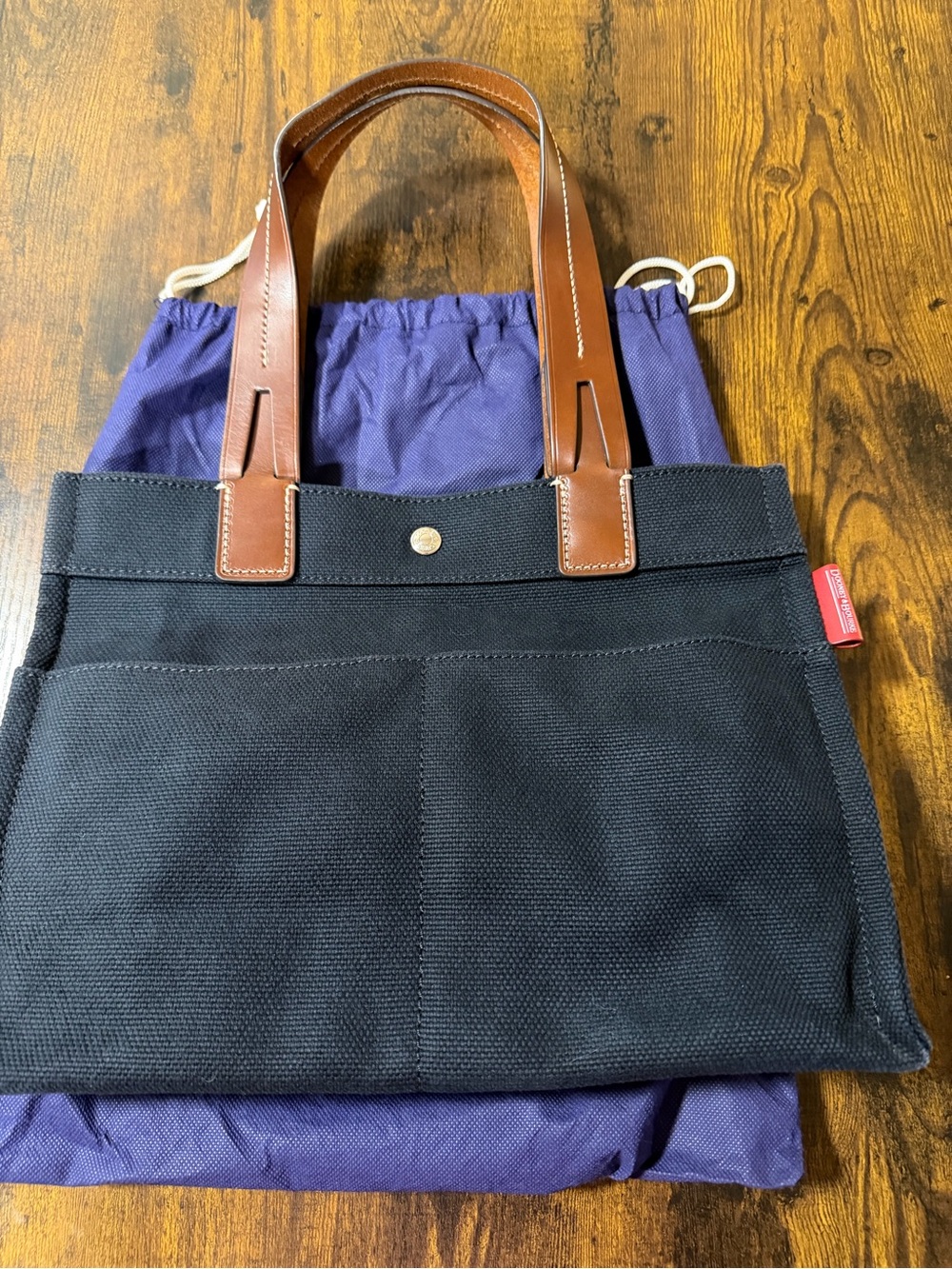 Dooney & Bourke Black Canvas Tote with Brown Leather Handles